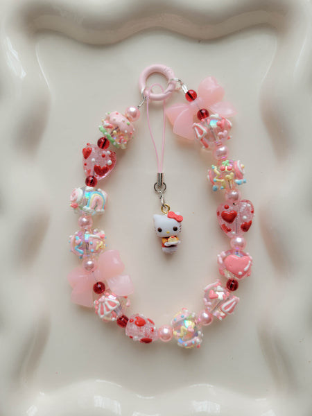Chunky Pink/Red Hello Kitty Wristlet + Phone Charm