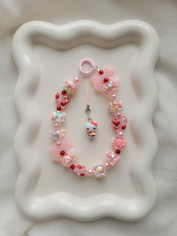Chunky Pink/Red Hello Kitty Wristlet + Phone Charm